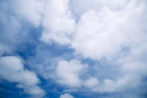 Altocumulus clouds on blue sky Stock Photos