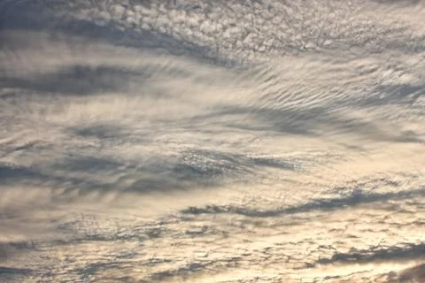 Altocumulus clouds in evening sky Stock Photos
