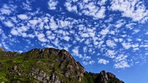 Altocumulus clouds floating over the Col d'Aubisque mountain in the Pyrenees Stock Footage 341537464