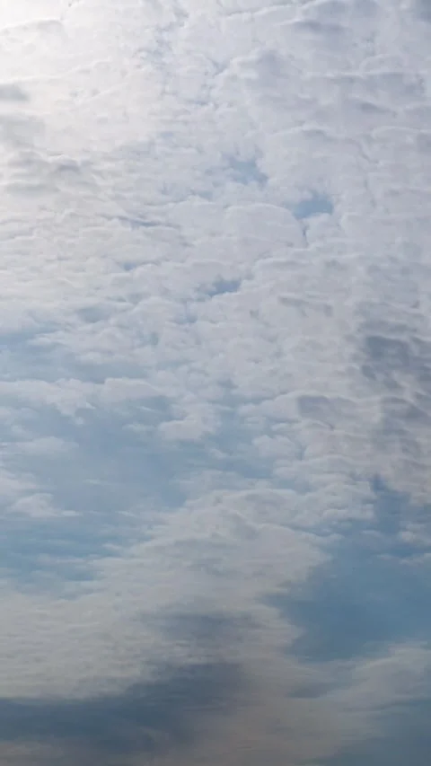 Altocumulus Clouds Moving Across Blue Sky Timelapse Stock Footage 345972508