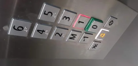 Aluminium buttons in a modern elevator Stock Photos
