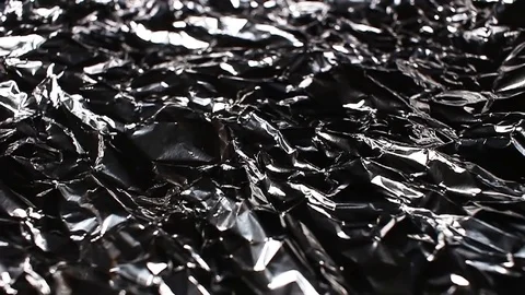 Aluminium foil rotating pattern macro texture background backdrop footage video. Stock Footage 91380185