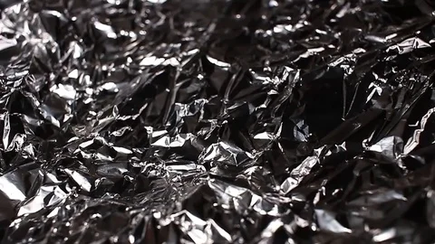 Aluminium foil rotating pattern macro texture background backdrop footage video. Stock Footage 91380228