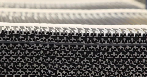 Aluminium metal bars stacked in rows showing uniform profile Stock Footage 199880213