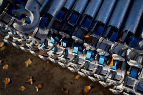 Aluminium tower components with connector hooks and blue locks Stock Photos
