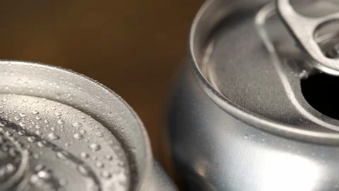 Aluminizing packaging for drinks, cans of soda stand in row, one is already open Stock Footage 117987366