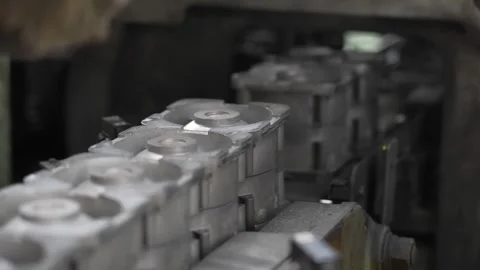 Aluminum Baseball Mold Blocks Moving Along Automated Line Close Up Vídeo Stock 339736680