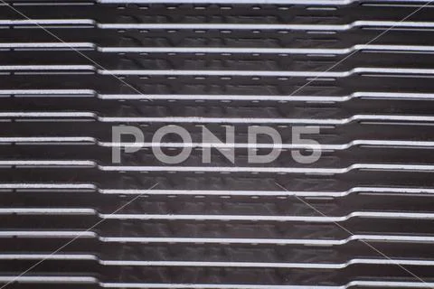 Aluminum radiator with copper heat pipe close-up with beautiful bokeh Stock Photos