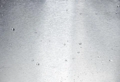 Aluminum surface with drops of water Stock Photos