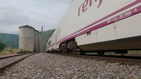 Alvia train of the Renfe - Operator company entering the San Esteban  station Stock Footage 204091401