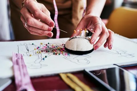 Always make time to create. an unrecognizable designer using a pincushion while Stock Photos