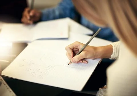 Always write the important points down. a group of unrecognizable people making Stock Photos