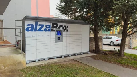 AlzaBox delivery boxes and automatic parcel lockers, panning shot Stockbeeldmateriaal 313463334
