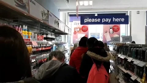'Am I only allowed one?' Londoners queue for rationed hand sanitiser at Oxford Stock Footage 272910734