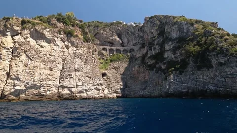 Amalfi Coast - Dramatic Sea View of Stone Viaduct and Vertical Cliffs Stock Footage 342130755