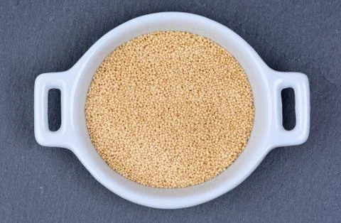 Amaranth seeds in a ceramic bowl Stock Photos