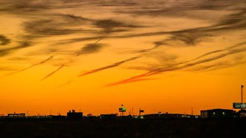 Amarillo. A dramatic golden orange sunset sky over Texas, USA, filled with .. Stock Photos