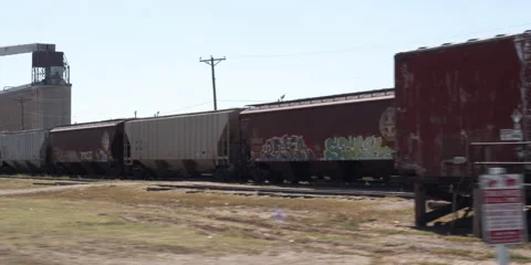 Amarillo, Texas -  TRAIN - Daylight - Slow Motion - Driving Footage Stock Footage 219493217