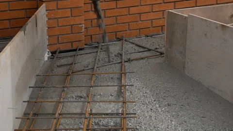 Amateur building technques of making base for a big house Stock Footage 125528459