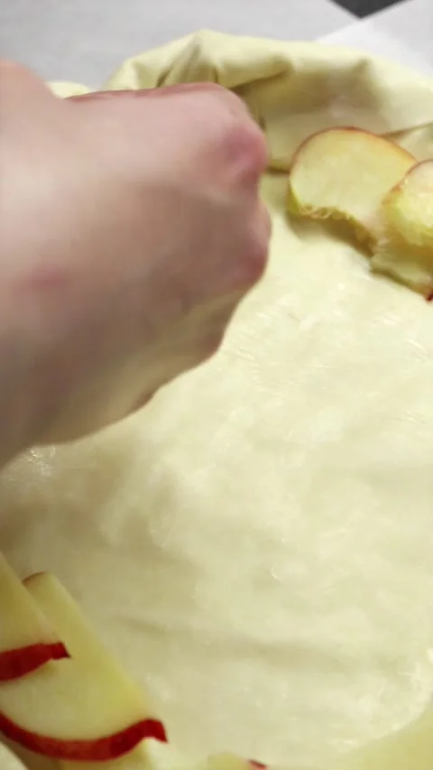Amateur cook learning to design fruit pastry pattern via online video course Stock-Footage 336848359