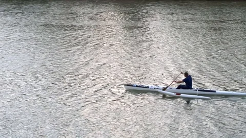 Amateur rowing on the Arno river Stock Footage 89647449