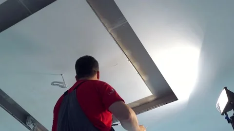 Amateur worker apply plaster on ceiling. Do it yourself new apartment decorating 스톡 동영상 155218507