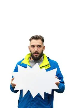 Amazed bearded man holding empty blank sheet of paper, isolated Stock Photos
