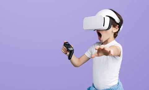 Amazed Boy Experiencing Virtual Reality with VR Headset Stock Photos