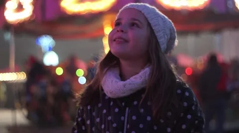 Amazed children carousel in background Stock Footage 44962472