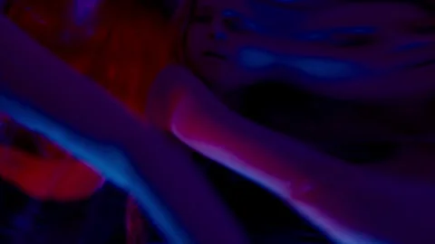 Amazed Female Dancer Looking in at Surreal Distorted Reflections Stock Footage 306983659