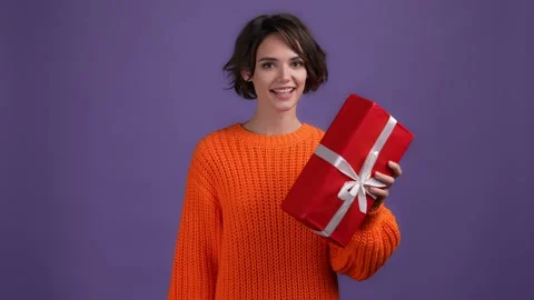 Amazed lady get package upset not like isolated vivid color background Stock Footage 169361342