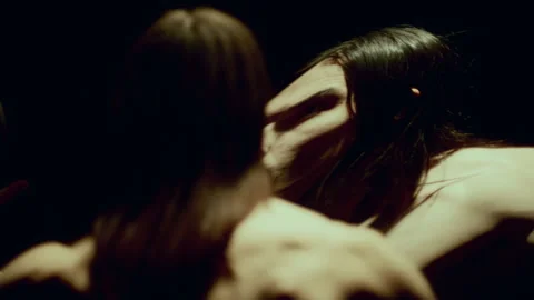 Amazed Man Looking Around at Distorted Reflections in Mirrored Walls Stock Footage 289879925