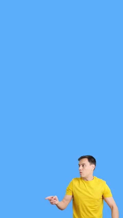 Amazed man pointing surprised to the side 動画素材 252483833