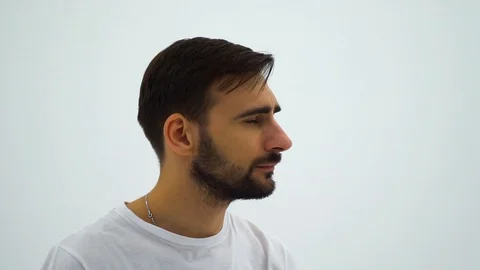 Amazed Surprised Man on a white background. Slow motion. Stock Footage 113002972