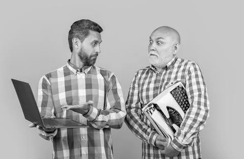 Amazed two writer show vs contrast in studio. writer show vs contrast on Stock Photos