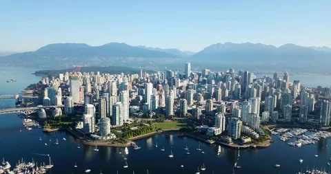 Amazing aerial drift overlooking idylic downtown Vancouver skyline with mount Stock Footage