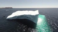 An Amazing Aerial Over A Man Standing On A Huge Iceberg In Newfoundland, Canada. Stock Footage