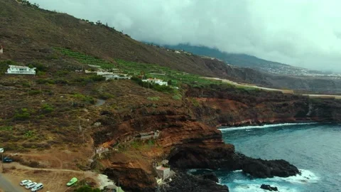 Amazing Aerial view of the cliffs next to the ocean.Costa de Acentejo Stock Footage 164855428