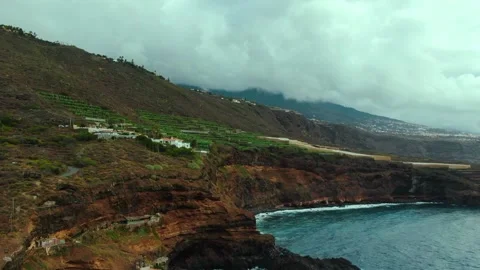 Amazing Aerial view of the cliffs next to the ocean.Costa de Acentejo Stock Footage 164855456