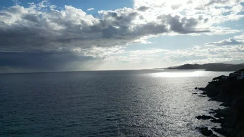 Amazing aerial view, clouds, sunlight, Spanish shore and city, 4K Stock Footage 274843591