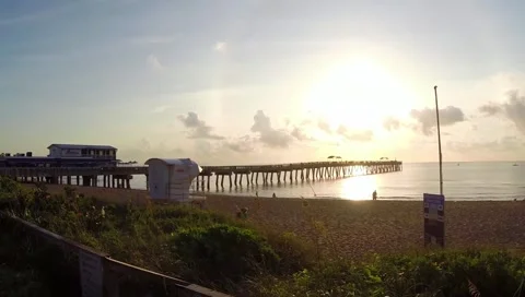 Amazing arial view of pier and beautiful sunrise at paradise beach Stock Footage 40465346
