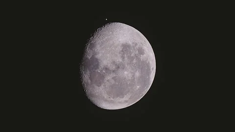 An amazing astronomical event, Moon surface covers planet Mars awe night sky Vídeos de archivo 154018965