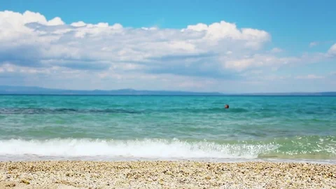 Amazing beach &amp; couple walking Video stock 76819175