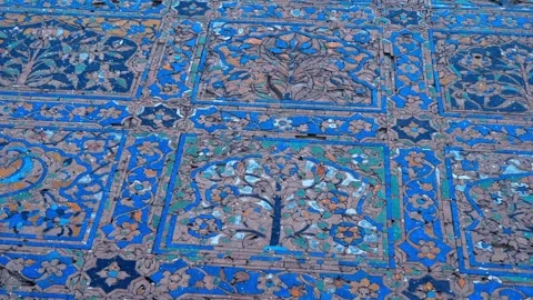 Amazing, beautiful blue floral patterns on the walls in ancient Indian temple Stock Footage 330888784