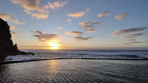 Amazing beautiful view of the sunset on the beach during summer time Stock Footage 230177394
