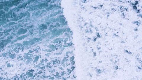 Amazing blue waves with white foam topdown drone view Stock Footage 209187787