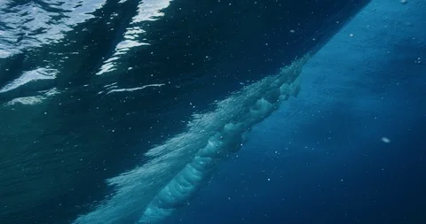 Amazing bubble rings below waves Stock Footage 114697653