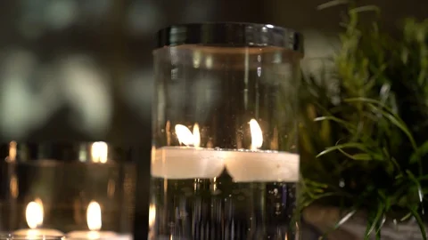 Amazing candles burning on the table Stock Footage 128947795