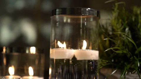 Amazing candles burning on the table Stock Footage 128948488