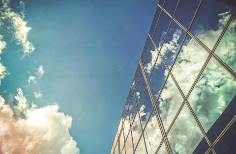 Amazing cloud and sky reflection on window glass building. Stock Photos